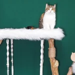 Designer Large Faux Fox Fur Cat Tree for Multiple Cats - A cat stands on the fur cat tree